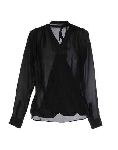   LA CAMICIA BIANCA