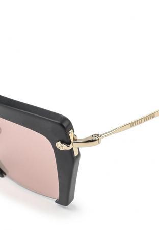 Солнцезащитные очки Miu Miu