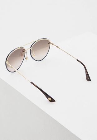 Солнцезащитные очки Gucci