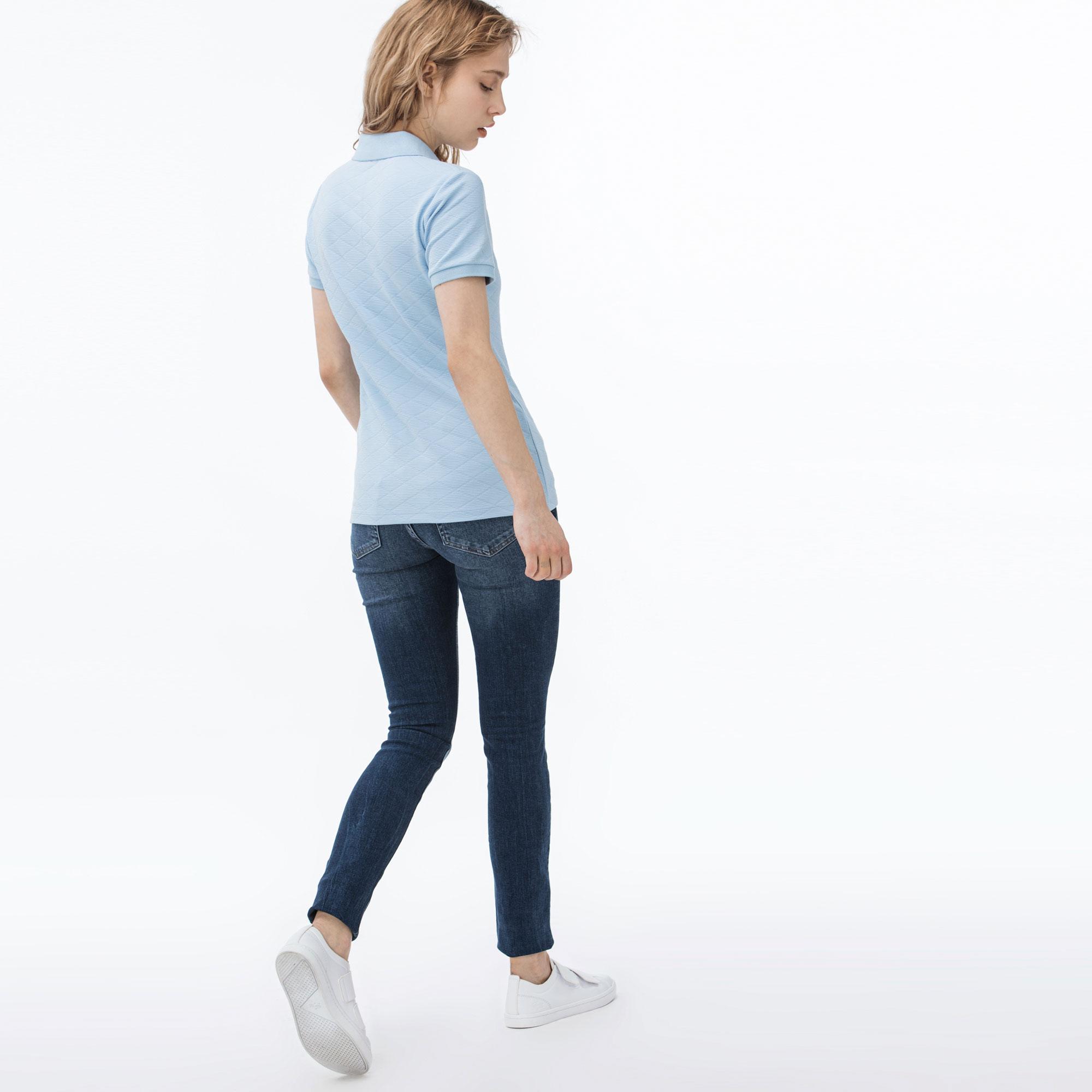 Джинсы Lacoste
