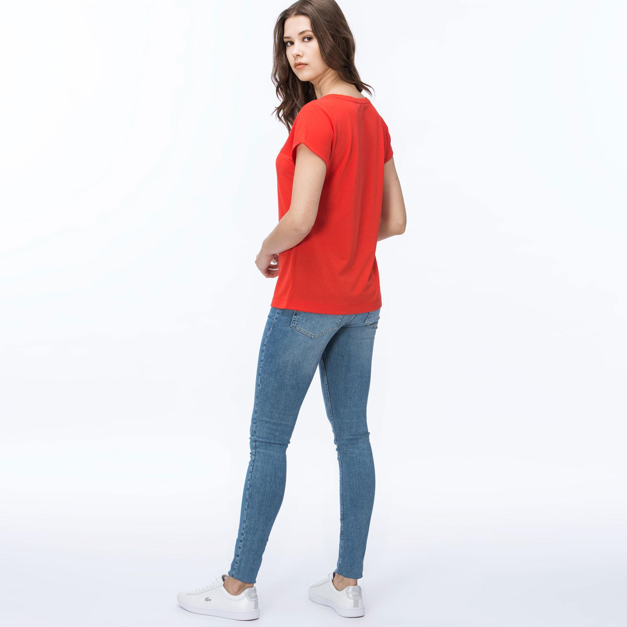 Джинсы Lacoste