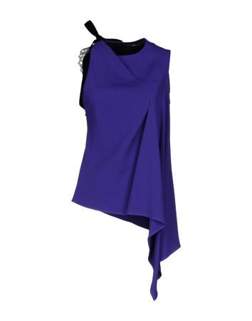 Топ ROLAND MOURET