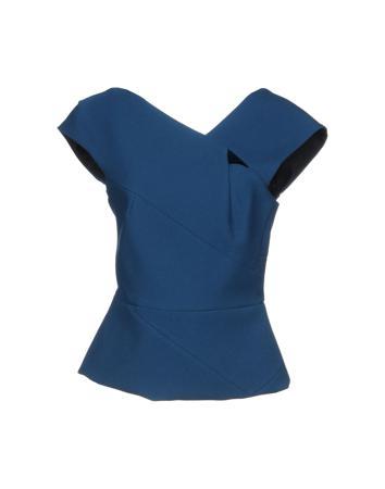 Топ ROLAND MOURET