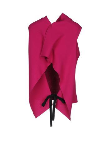 Топ ROLAND MOURET